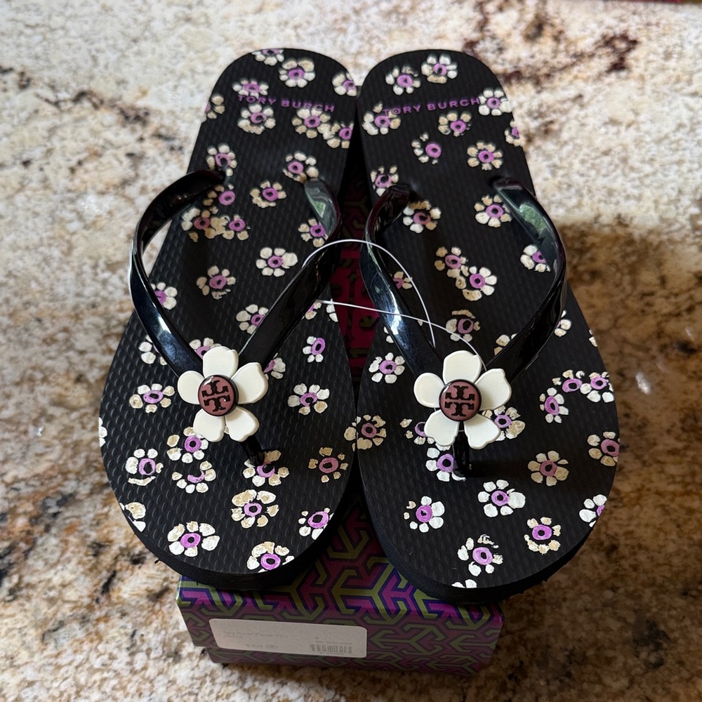 Tory Burch Black Floral Flip Flop Sandals with Logo Flower